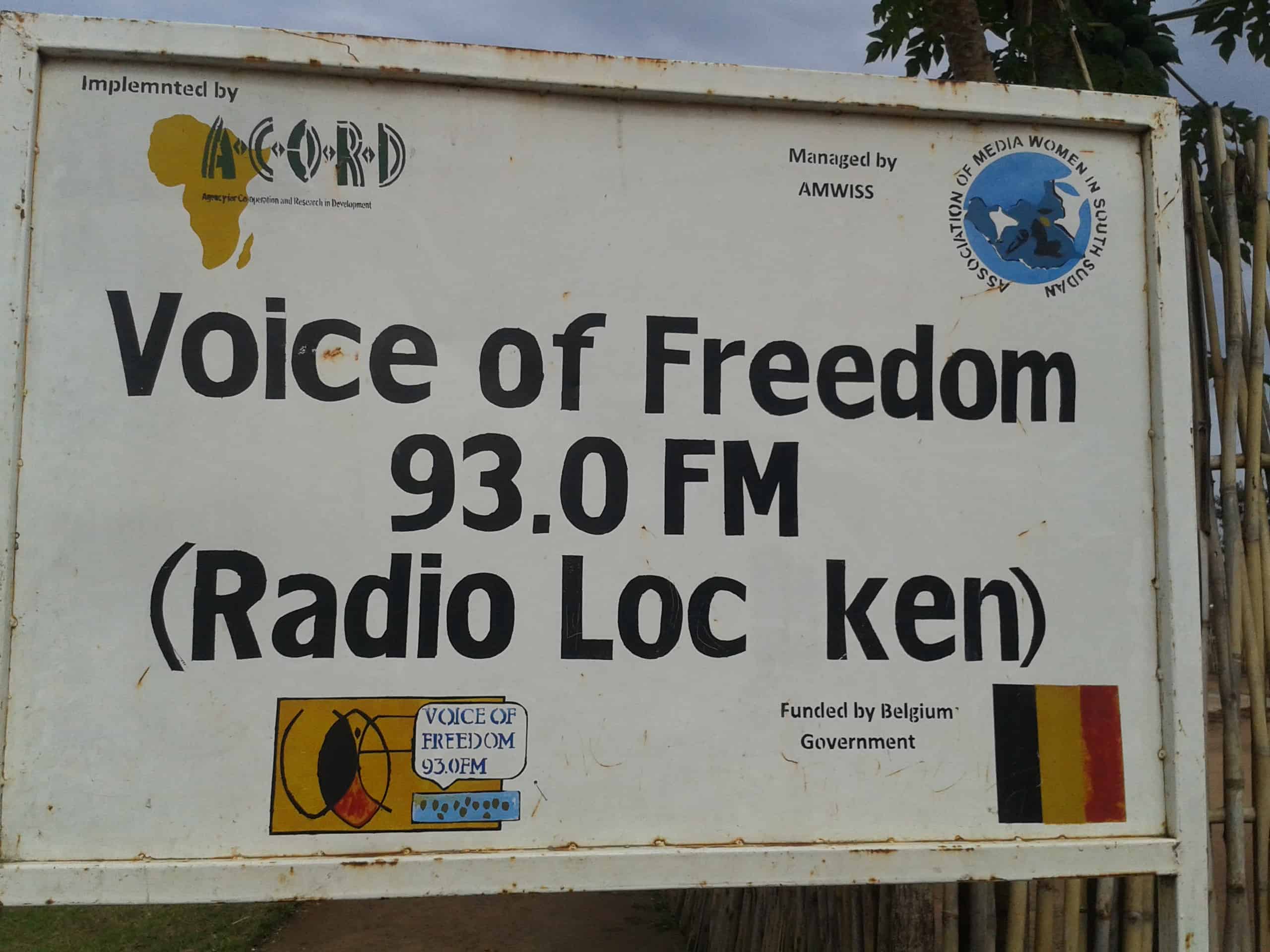 Sign in front of the radio station says, 