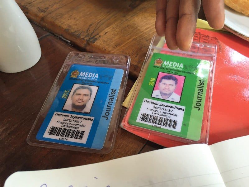 Two press id badges