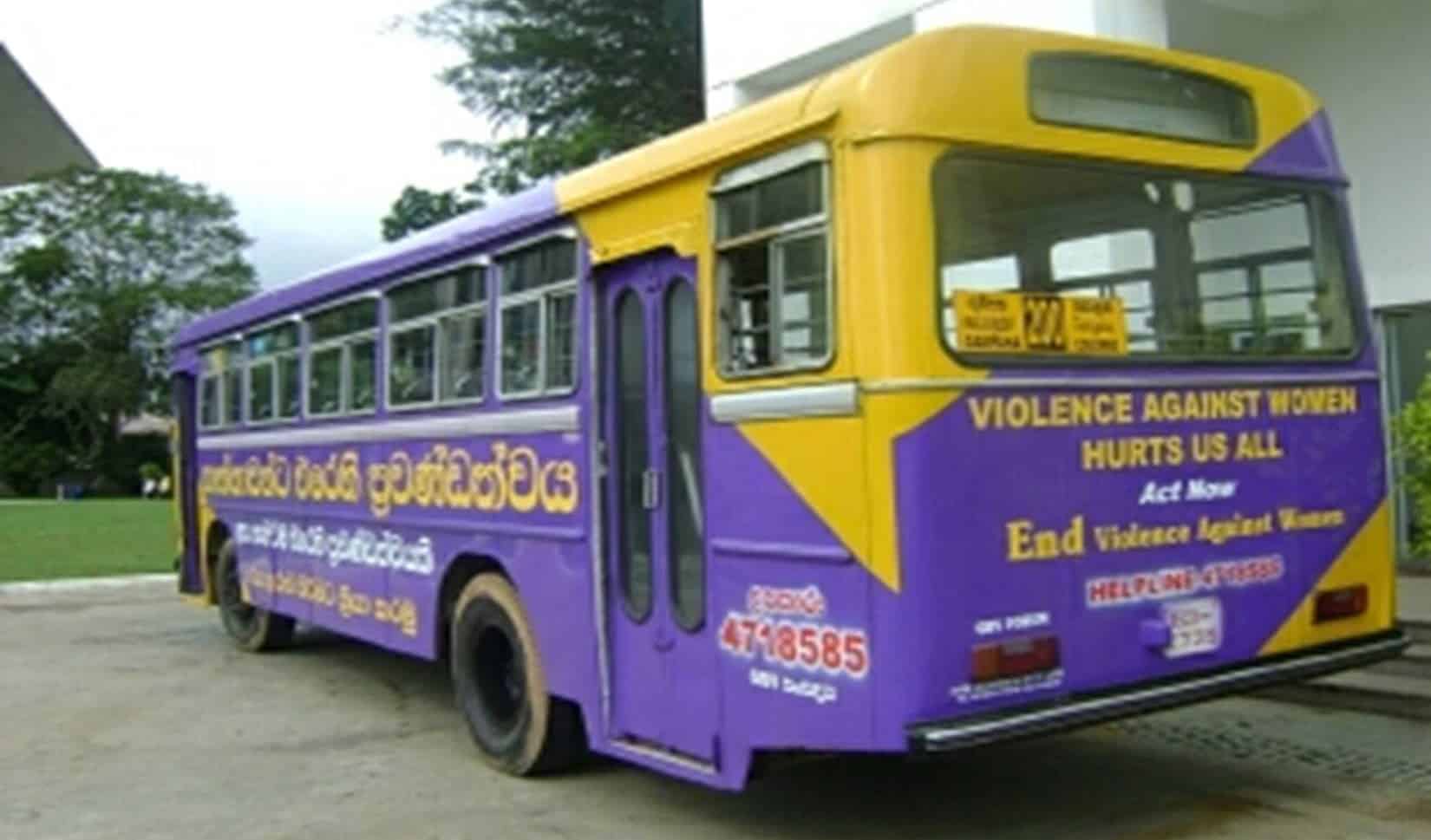 A purple and yellow bus with 