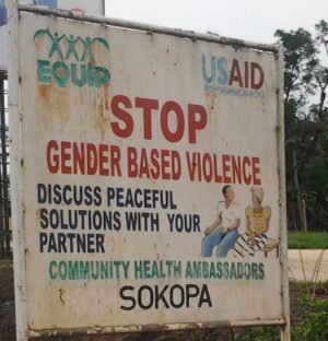 Billboard that says Stop Gender Based Violence. Discuss Peaceful solutions with your Partner