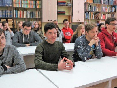 Students sit in a classroom
