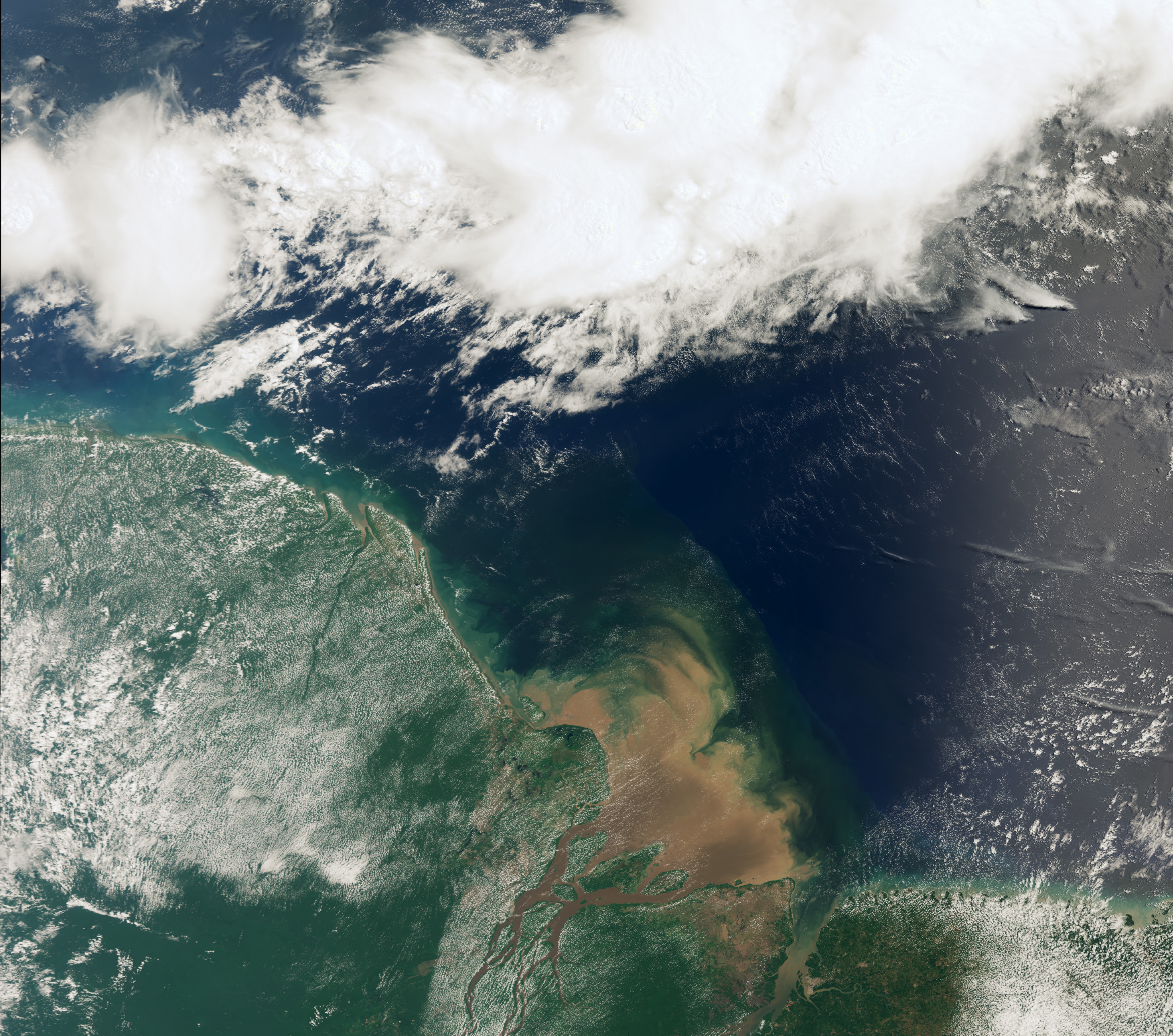 Overhead view of clouds over a body of water