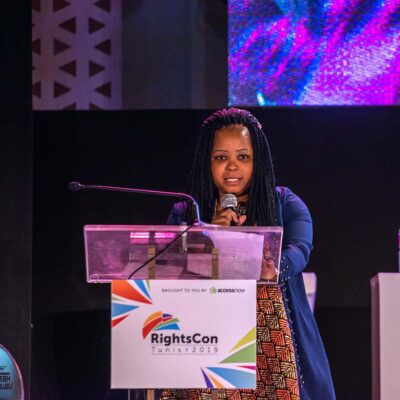 A woman speaking at RightsCon Tunis 2019.