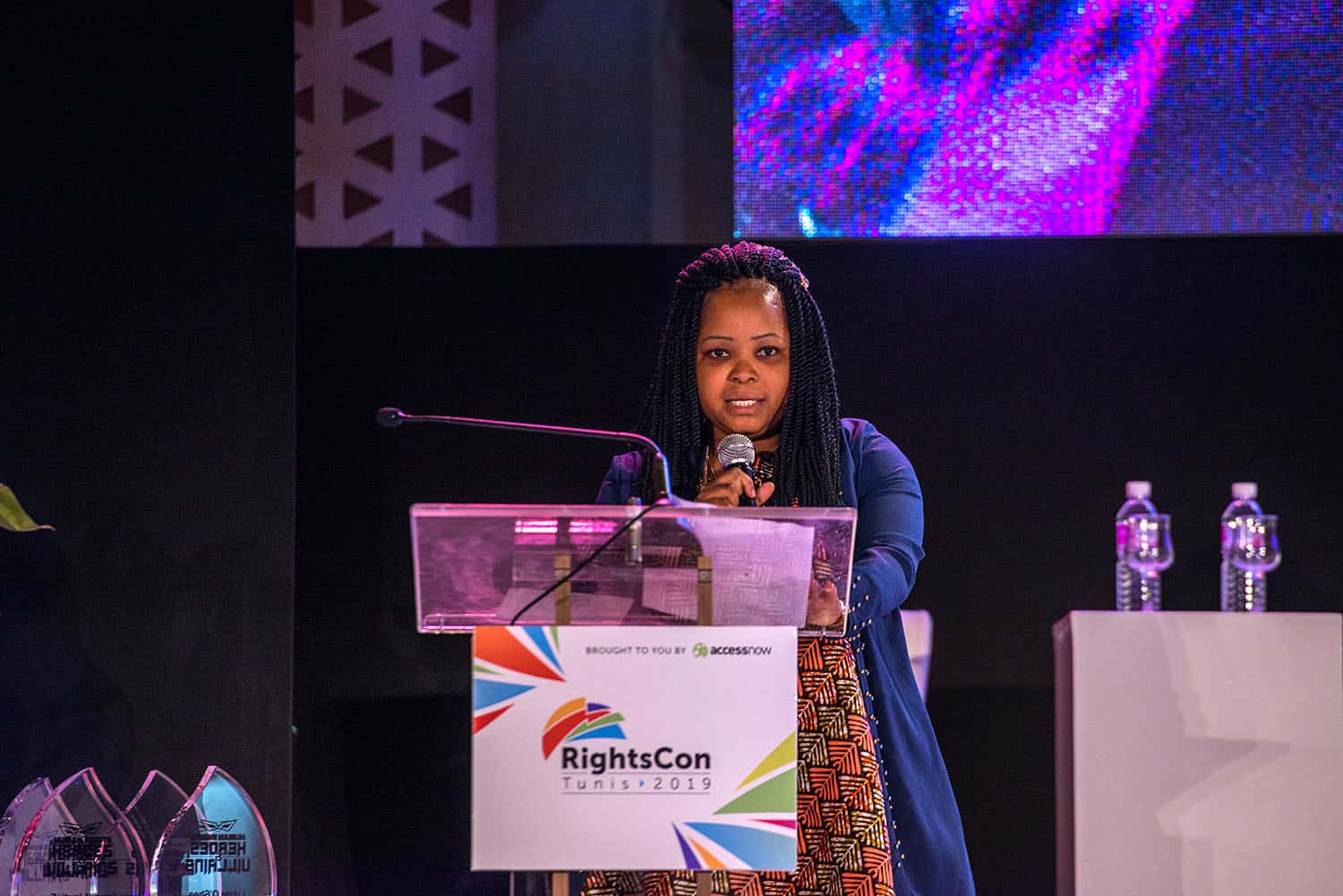 A woman speaking at RightsCon Tunis 2019.