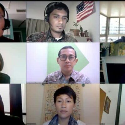 Screenshot of several faces on a zoom meeting