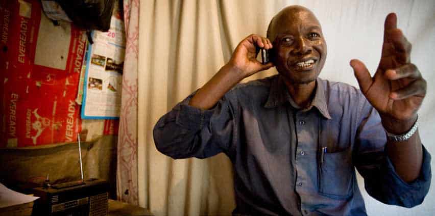 A man talks on a smart phone