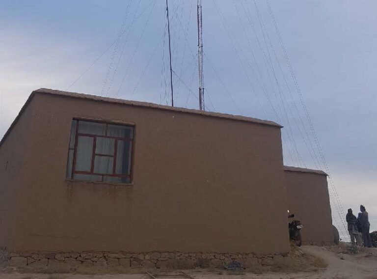 Concrete building with an antenna.